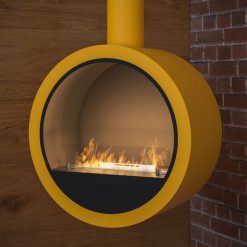 Foto de ambiente de la chimenea exenta de bioetanol de Infire INCYRCLE, color amarillo